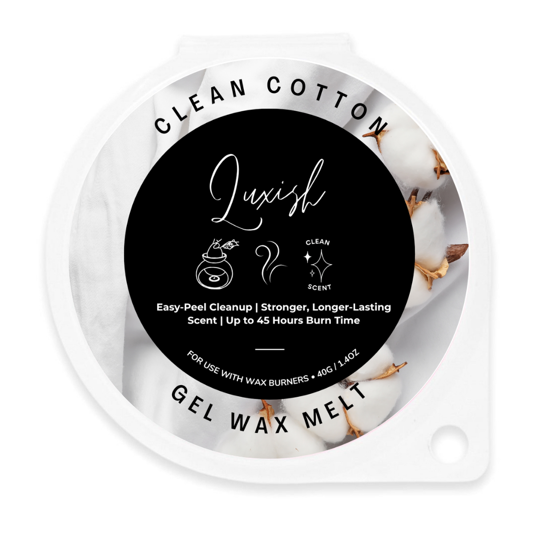 A round gel wax melt container labeled 'Clean Cotton' by Luxish, featuring a black center label with white text and cotton imagery on a white background.