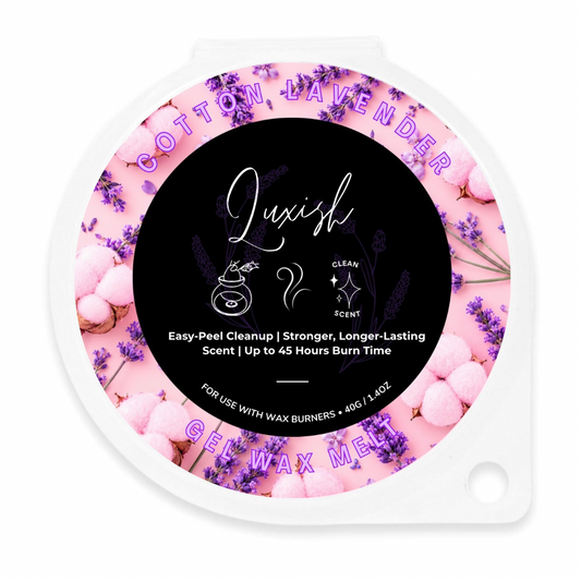 A single round wax melt container labeled 'Luxish' in cotton lavender scent. The lid features a black center with white text and illustrations, surrounded by a pink border decorated with pink cotton bolls and purple lavender flowers.