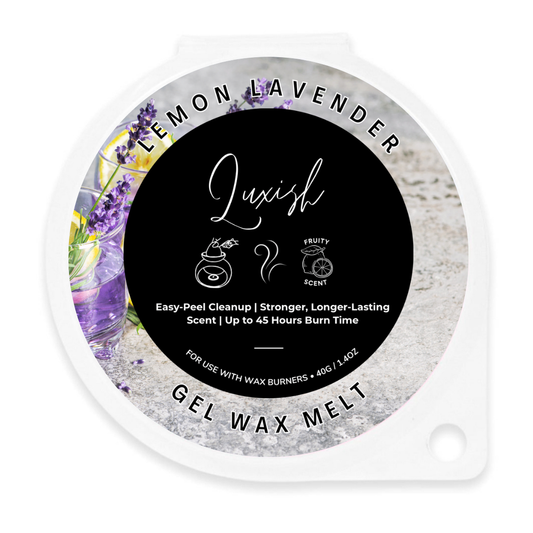 A round gel wax melt container labeled 'Lemon Lavender' by Luxh Fragrance. The lid features a black center with white text and a gray stone-textured outer ring decorated with purple lavender flowers and a lemon slice illustration.
